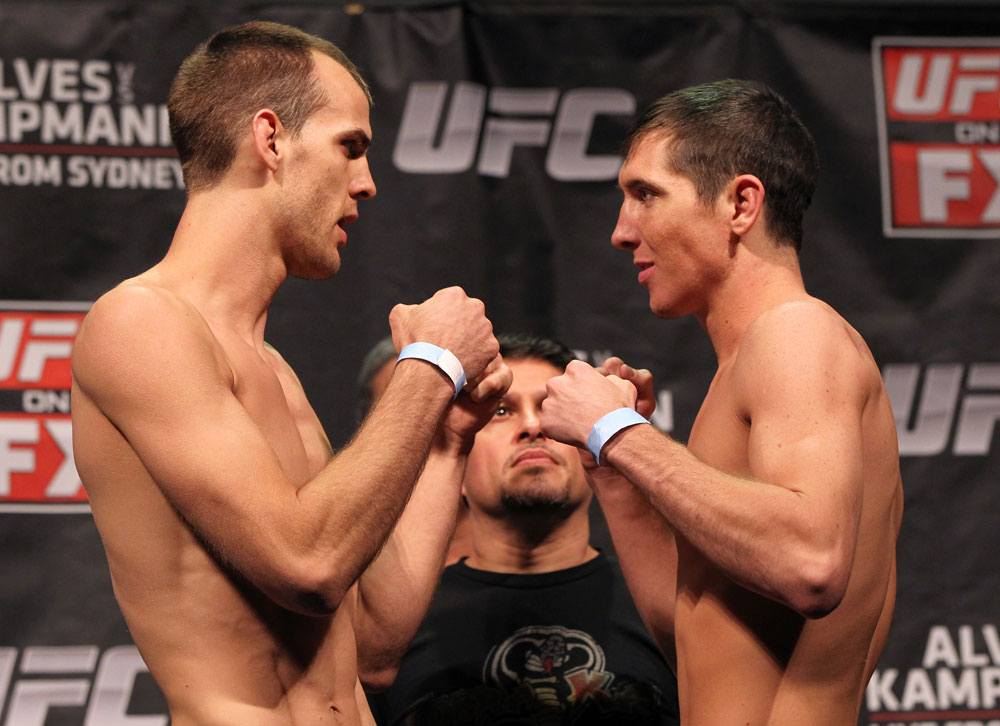 SYDNEY, AUSTRALIA - MARCH 02: (L-R) Featherweight opponents Cole Miller and Steven Siler face off after weighing in during the UFC on FX official weigh in at Allphones Arena on March 2, 2012 in Sydney, Australia. (Photo by Josh Hedges/Zuffa LLC/Zuffa LLC via Getty Images) *** Local Caption *** Cole Miller; Steven Siler