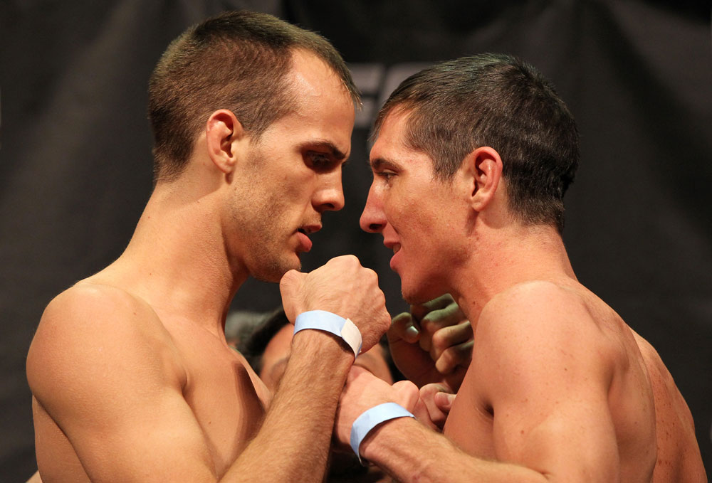 SYDNEY, AUSTRALIA - MARCH 02: (L-R) Featherweight opponents Cole Miller and Steven Siler face off after weighing in during the UFC on FX official weigh in at Allphones Arena on March 2, 2012 in Sydney, Australia. (Photo by Josh Hedges/Zuffa LLC/Zuffa LLC via Getty Images) *** Local Caption *** Cole Miller; Steven Siler
