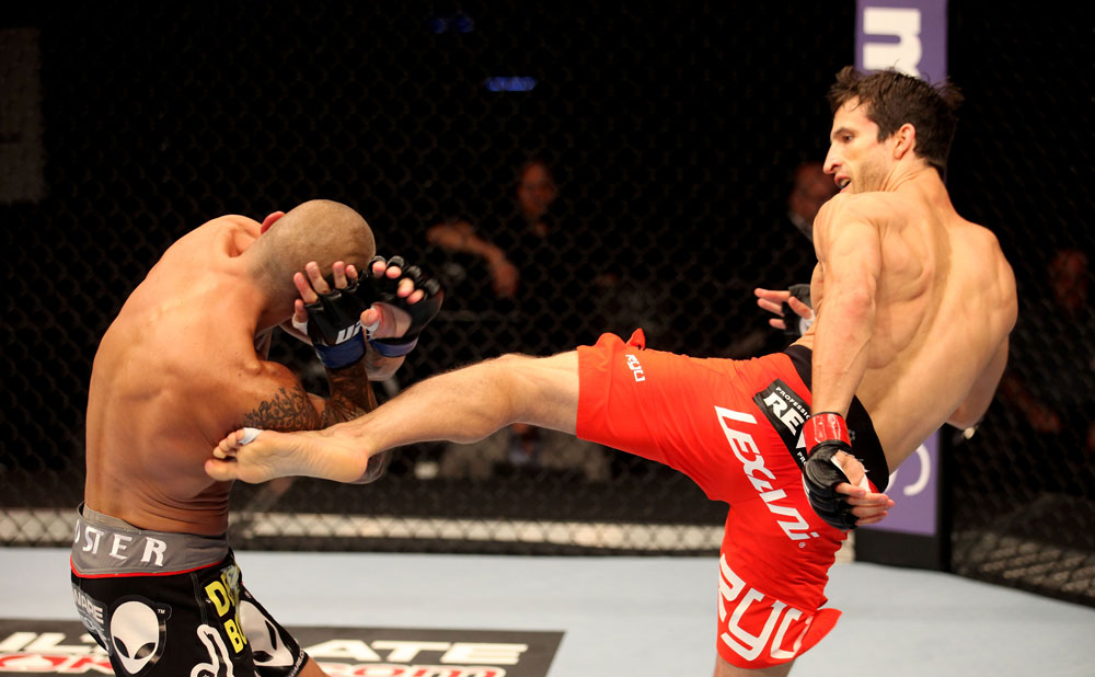 ATLANTIC CITY, NJ - JUNE 22: Ken Stone (R) kicks Dustin Pague (L) in a bantamweight bout during UFC on FX 4 at Revel Casino on June 22, 2012 in Atlantic City, New Jersey. (Photo by Nick Laham/Zuffa LLC/Zuffa LLC)