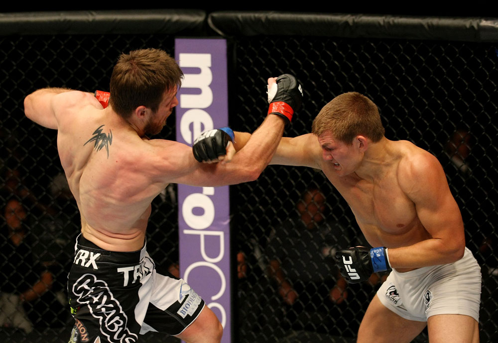 ATLANTIC CITY, NJ - JUNE 22:  Dan Miller (L) and Ricardo Funch (R) exchange punches in a welterweight bout during UFC on FX 4 at Revel Casino on June 22, 2012 in Atlantic City, New Jersey.  (Photo by Nick Laham/Zuffa LLC/Zuffa LLC)