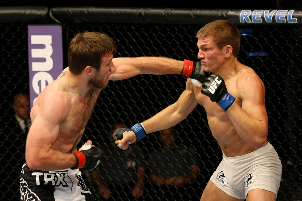 ATLANTIC CITY, NJ - JUNE 22: Dan Miller (L) and Ricardo Funch (R) exchange punches in a welterweight bout during UFC on FX 4 at Revel Casino on June 22, 2012 in Atlantic City, New Jersey. (Photo by Nick Laham/Zuffa LLC/Zuffa LLC)