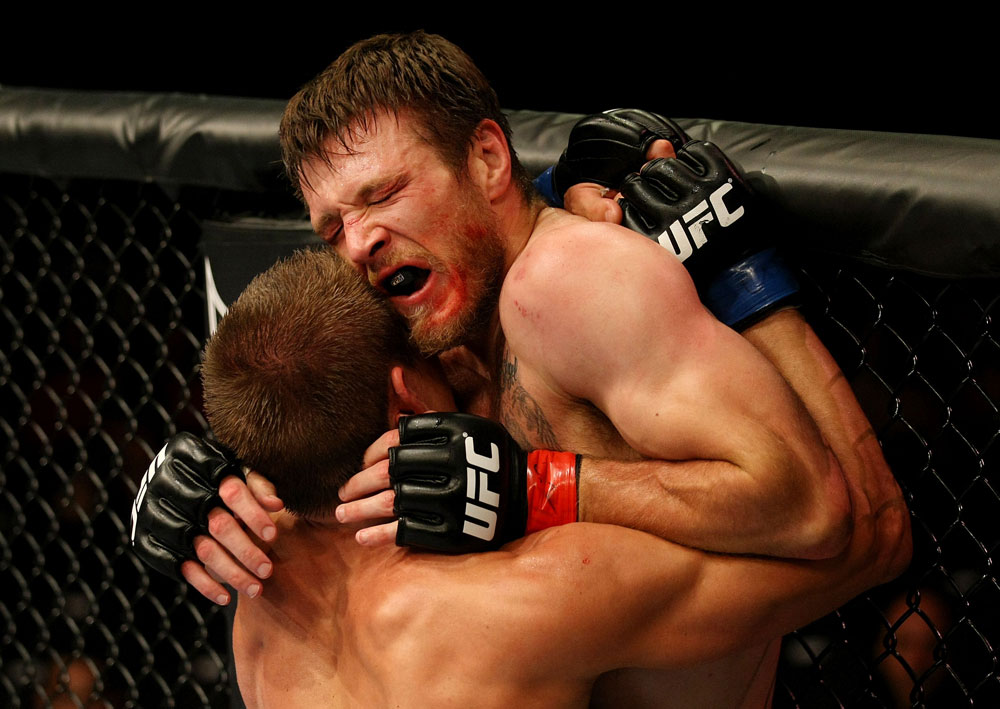 ATLANTIC CITY, NJ - JUNE 22: (L-R) Ricardo Funch and Dan Miller grapple against the fence in a welterweight bout during UFC on FX 4 at Revel Casino on June 22, 2012 in Atlantic City, New Jersey.  (Photo by Nick Laham/Zuffa LLC/Zuffa LLC)