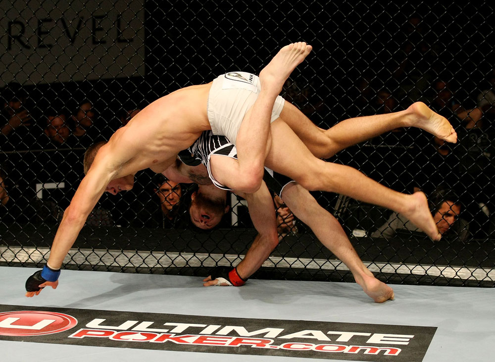 ATLANTIC CITY, NJ - JUNE 22:  Ricardo Funch (T) takes down Dan Miller (B) in a welterweight bout during UFC on FX 4 at Revel Casino on June 22, 2012 in Atlantic City, New Jersey.  (Photo by Nick Laham/Zuffa LLC/Zuffa LLC)