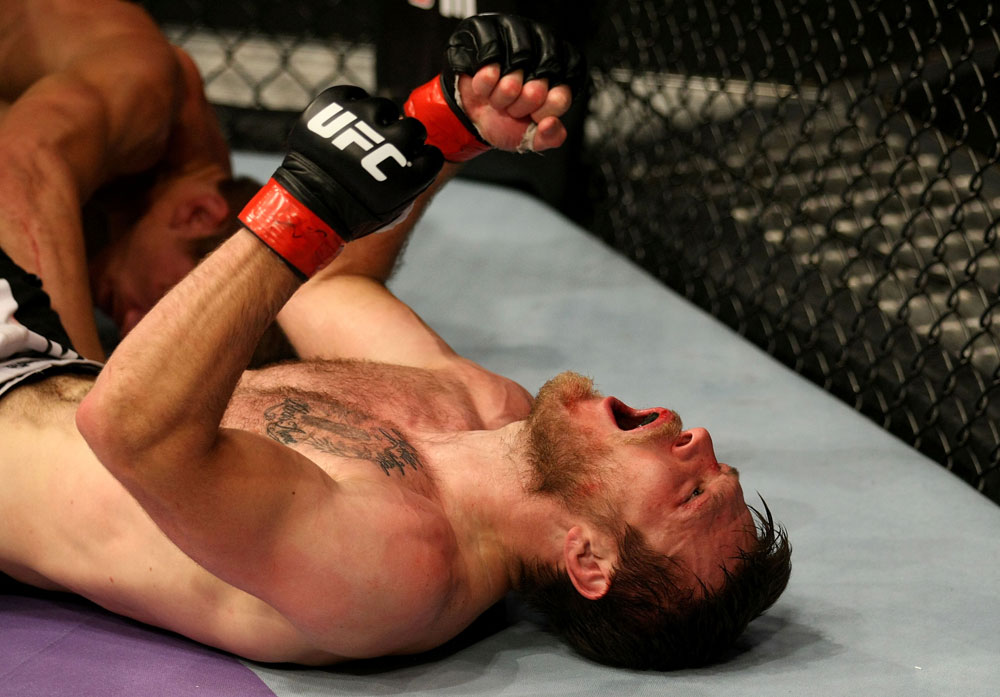 ATLANTIC CITY, NJ - JUNE 22:  Dan Miller celebrates his submission by guillotine choke to win over Ricardo Funch (not pictured) in a welterweight bout during UFC on FX 4 at Revel Casino on June 22, 2012 in Atlantic City, New Jersey.  (Photo by Nick Laham/Zuffa LLC/Zuffa LLC)