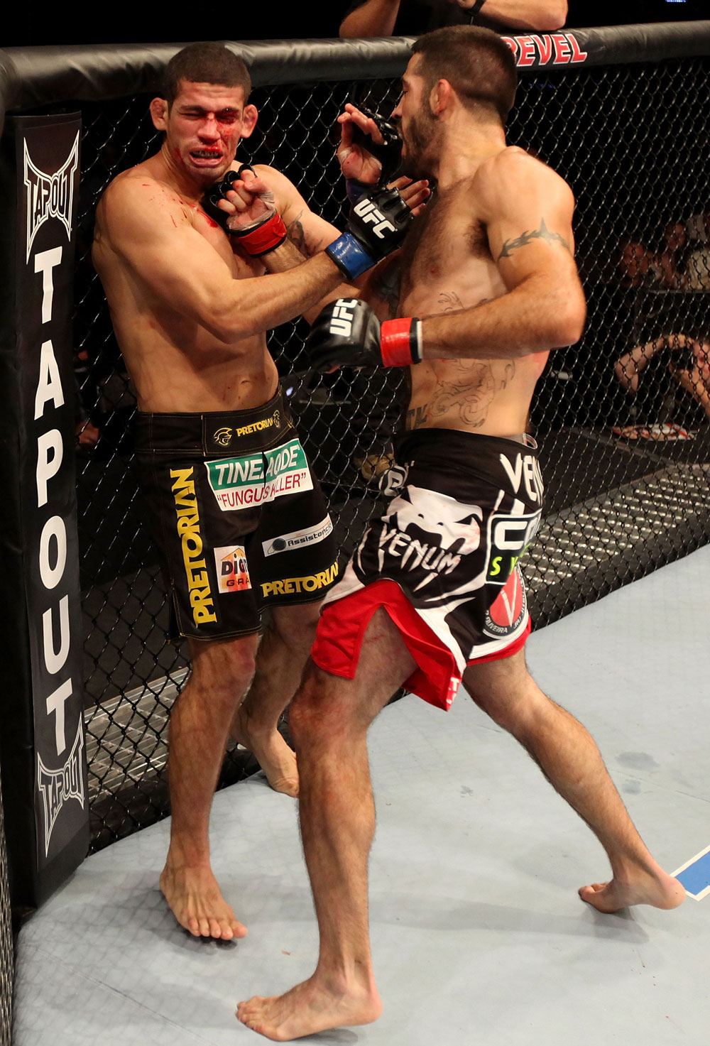 ATLANTIC CITY, NJ - JUNE 22: Matt Brown (R) punches Luis Ramos (L) in a welterweight bout during UFC on FX 4 at Revel Casino on June 22, 2012 in Atlantic City, New Jersey.  (Photo by Nick Laham/Zuffa LLC/Zuffa LLC)