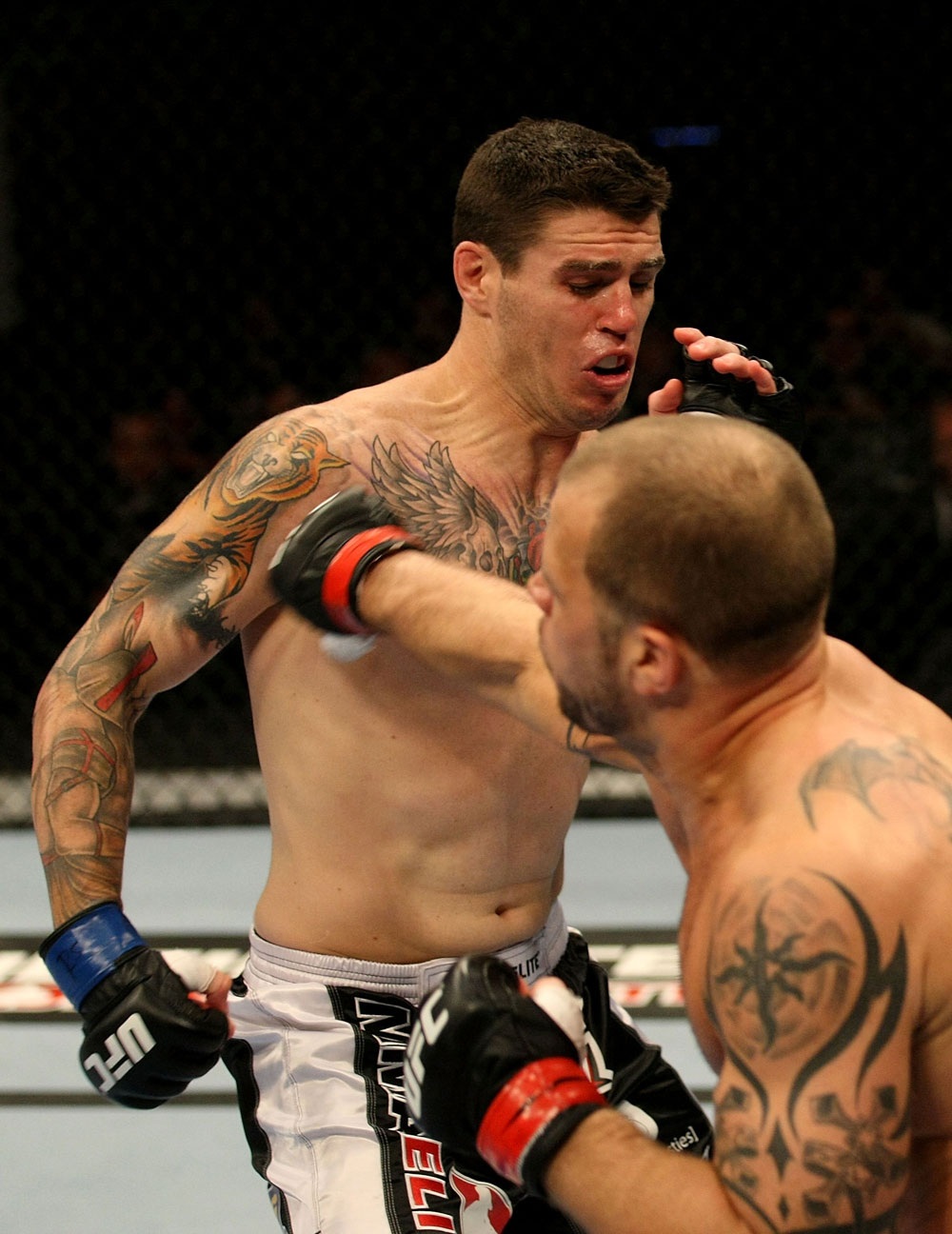 ATLANTIC CITY, NJ - JUNE 22: Nick Catone (R) throws a punch against Chris Camozzi (L) in a middleweight bout during UFC on FX 4 at Revel Casino on June 22, 2012 in Atlantic City, New Jersey.  (Photo by Nick Laham/Zuffa LLC/Zuffa LLC)