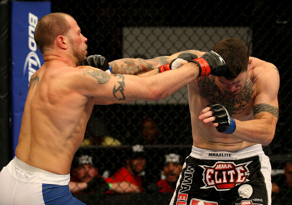 ATLANTIC CITY, NJ - JUNE 22:  Nick Catone (L) and Chris Camozzi (R) exchange punches in a middleweight bout during UFC on FX 4 at Revel Casino on June 22, 2012 in Atlantic City, New Jersey.  (Photo by Nick Laham/Zuffa LLC/Zuffa LLC)