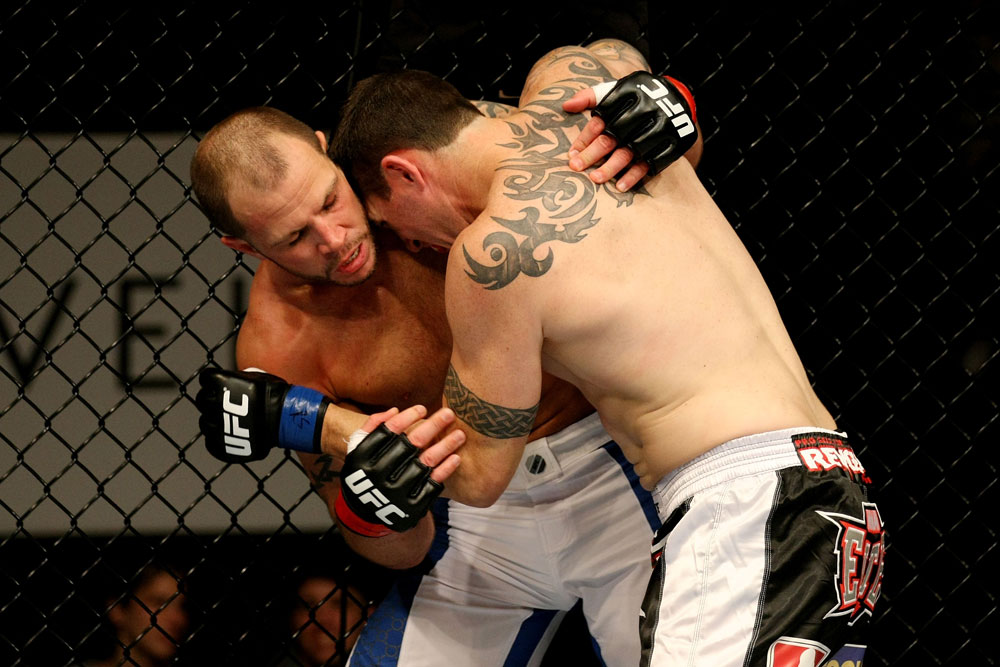 ATLANTIC CITY, NJ - JUNE 22:  Nick Cantone (L) grapples against the fence against Chris Camozzi (R) in a middleweight bout during UFC on FX 4 at Revel Casino on June 22, 2012 in Atlantic City, New Jersey.  (Photo by Nick Laham/Zuffa LLC/Zuffa LLC)
