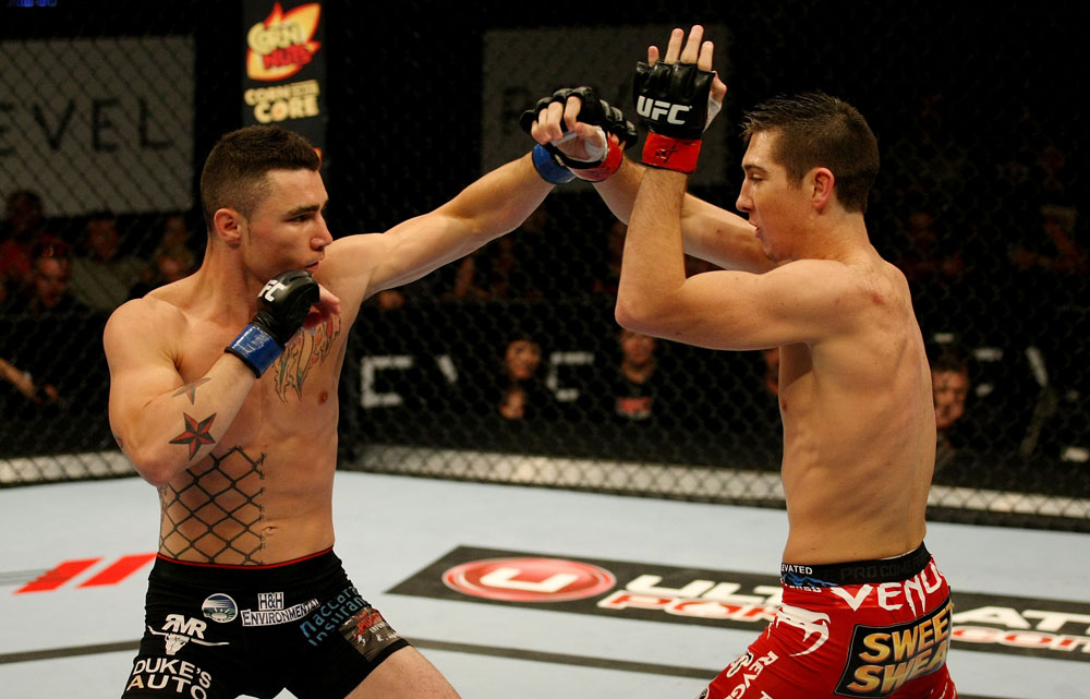ATLANTIC CITY, NJ - JUNE 22: Joe Gambino (L) throws a punch against Steven Siler (R) in a featherweight bout during UFC on FX 4 at Revel Casino on June 22, 2012 in Atlantic City, New Jersey.  (Photo by Nick Laham/Zuffa LLC/Zuffa LLC)