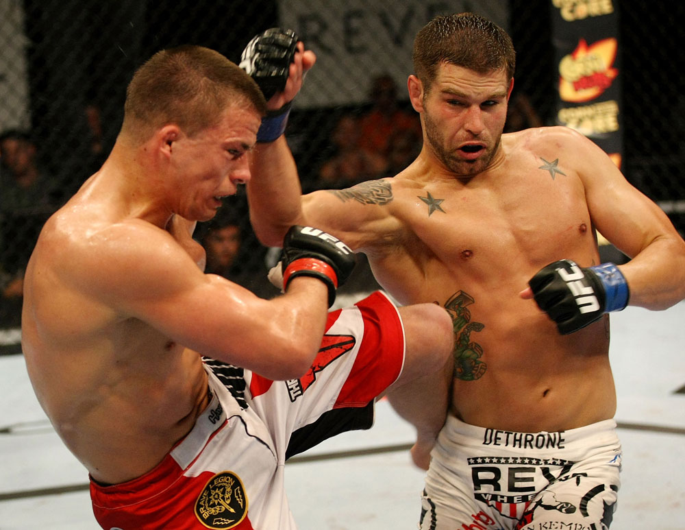 ATLANTIC CITY, NJ - JUNE 22:  Brock Jardine (R) throws a punch against Rick Story (L) who throws a kick in a welterweight bout during UFC on FX 4 at Revel Casino on June 22, 2012 in Atlantic City, New Jersey.  (Photo by Nick Laham/Zuffa LLC/Zuffa LLC)