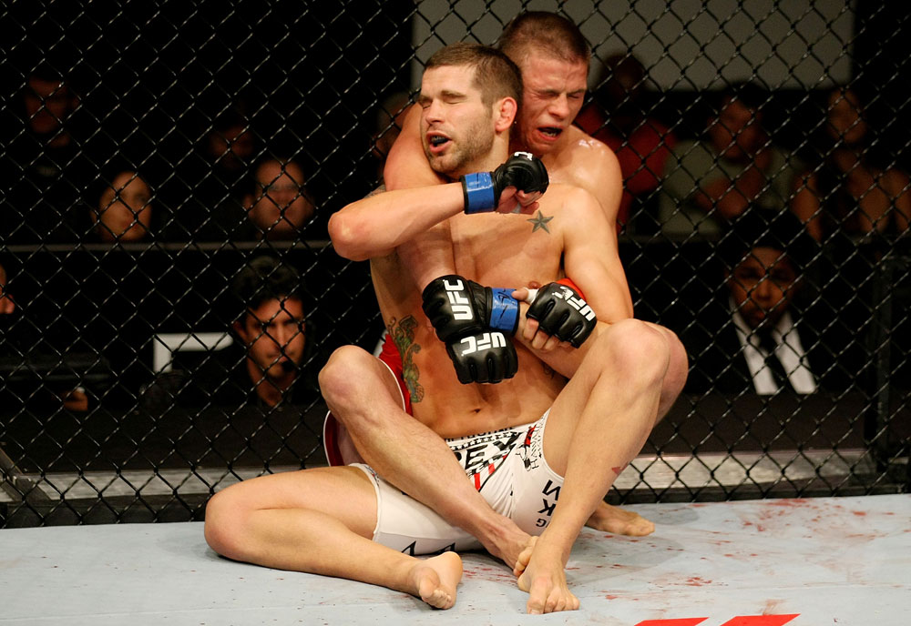 ATLANTIC CITY, NJ - JUNE 22: Brock Jardine (L) punches Rick Story (R) in a welterweight bout during UFC on FX 4 at Revel Casino on June 22, 2012 in Atlantic City, New Jersey.  (Photo by Nick Laham/Zuffa LLC/Zuffa LLC)