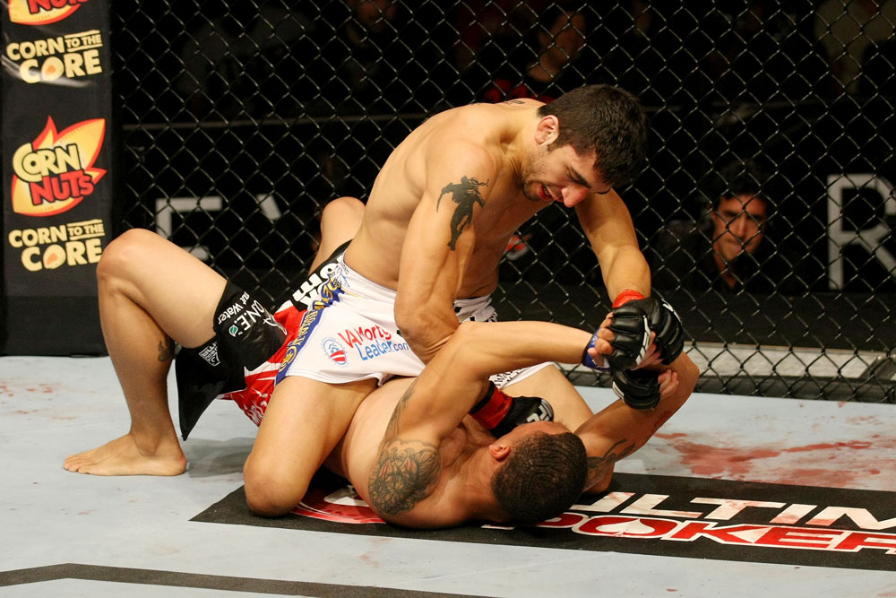 ATLANTIC CITY, NJ - JUNE 22:  Ramsey Nijem (T) punches C.J. Keith (B) in a lightweight bout during UFC on FX 4 at Revel Casino on June 22, 2012 in Atlantic City, New Jersey.  (Photo by Nick Laham/Zuffa LLC/Zuffa LLC)