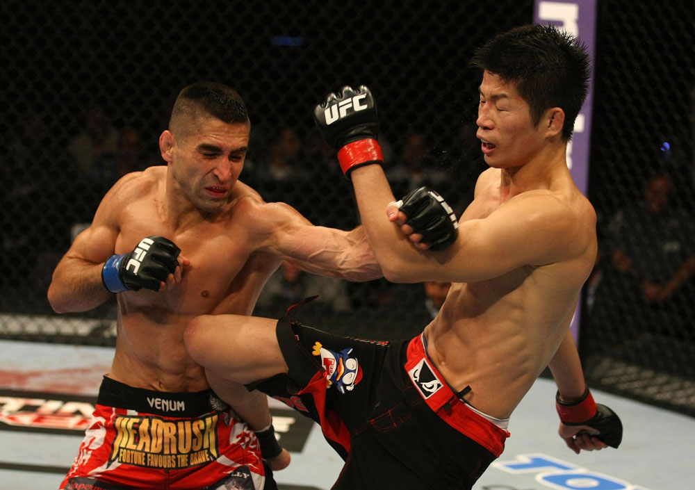 ATLANTIC CITY, NJ - JUNE 22:  Ricardo Lamas (L) punches Hatsu Hioki (R) who returns with a kick in a featherweight bout during UFC on FX 4 at Revel Casino on June 22, 2012 in Atlantic City, New Jersey.  (Photo by Nick Laham/Zuffa LLC/Zuffa LLC)