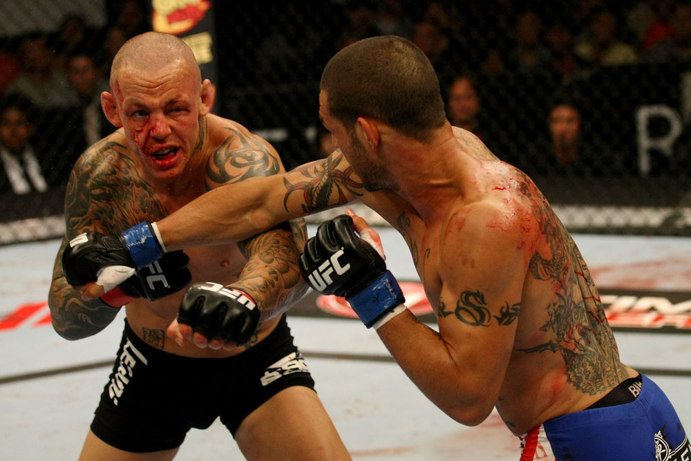 ATLANTIC CITY, NJ - JUNE 22: Cub Swanson (R) punches Ross Pearson (L) in a featherweight bout during UFC on FX 4 at Revel Casino on June 22, 2012 in Atlantic City, New Jersey.  (Photo by Nick Laham/Zuffa LLC/Zuffa LLC)