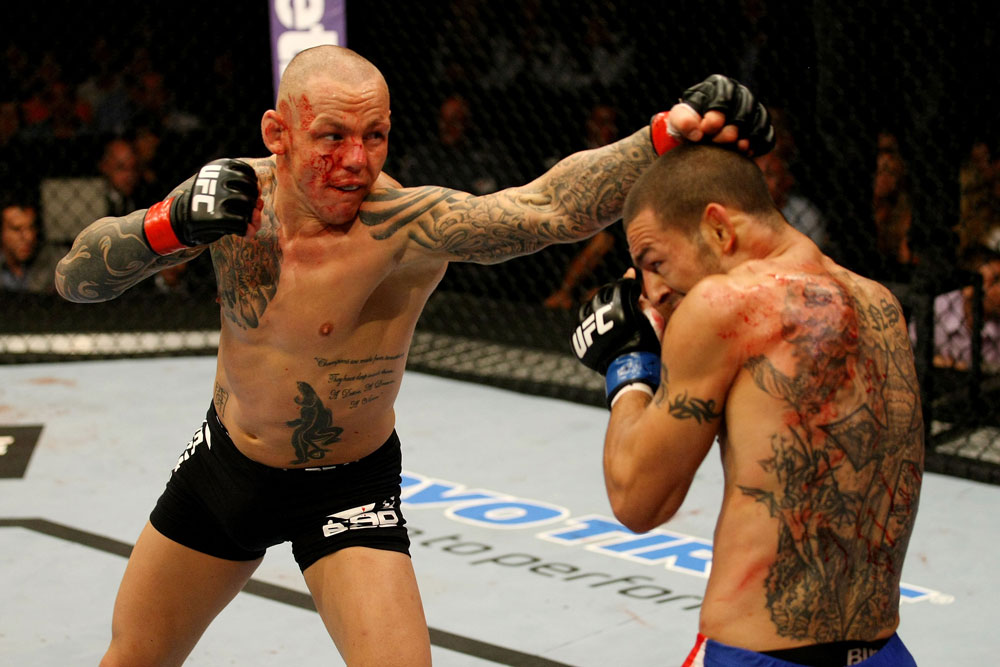 ATLANTIC CITY, NJ - JUNE 22: Ross Pearson (L) punches Cub Swanson (R) in a featherweight bout during UFC on FX 4 at Revel Casino on June 22, 2012 in Atlantic City, New Jersey.  (Photo by Nick Laham/Zuffa LLC/Zuffa LLC)