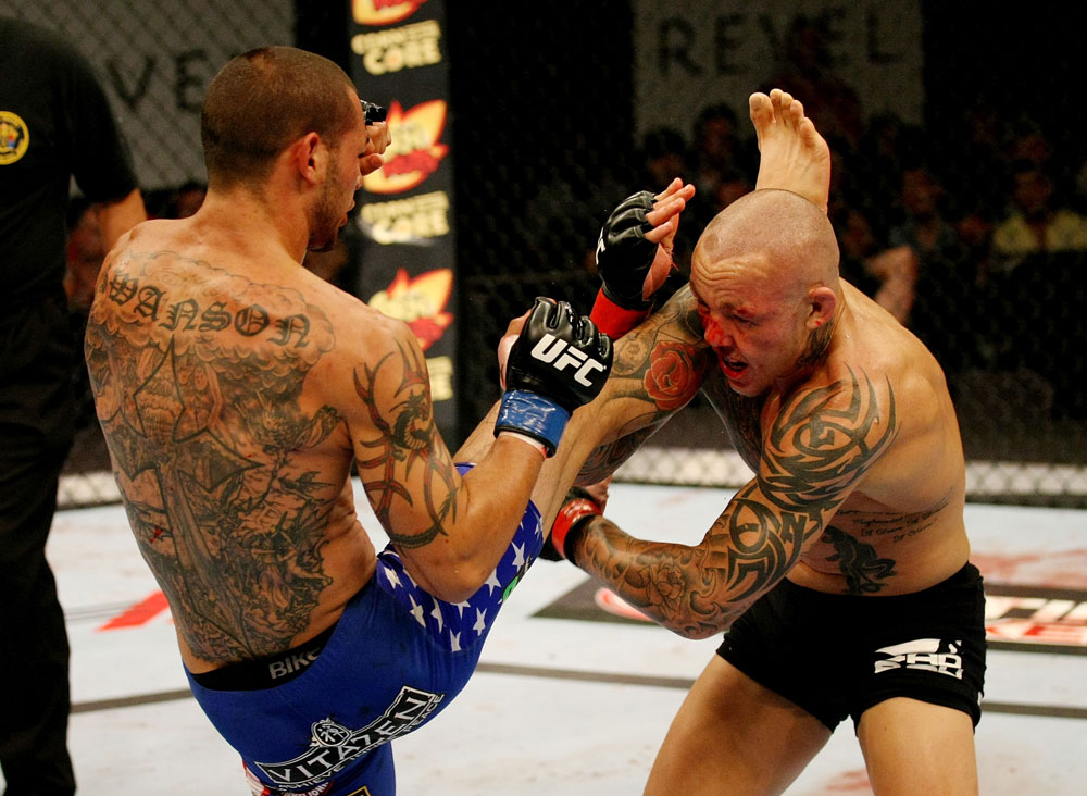 ATLANTIC CITY, NJ - JUNE 22:  Cub Swanson (L) kicks Ross Pearson (R) in a featherweight bout during UFC on FX 4 at Revel Casino on June 22, 2012 in Atlantic City, New Jersey.  (Photo by Nick Laham/Zuffa LLC/Zuffa LLC)