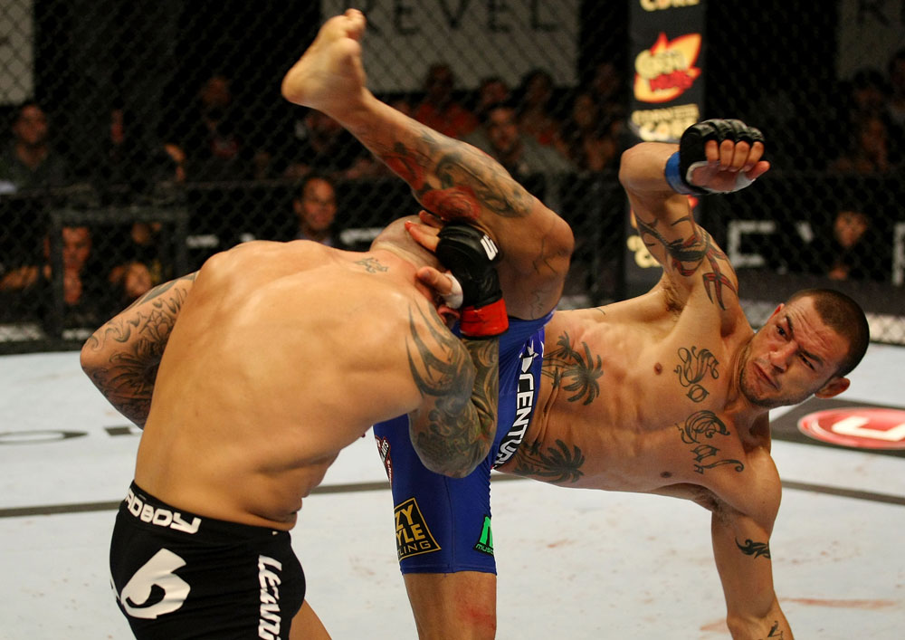 ATLANTIC CITY, NJ - JUNE 22:  Cub Swanson (R) kicks Ross Pearson (L) in a featherweight bout during UFC on FX 4 at Revel Casino on June 22, 2012 in Atlantic City, New Jersey.  (Photo by Nick Laham/Zuffa LLC/Zuffa LLC)