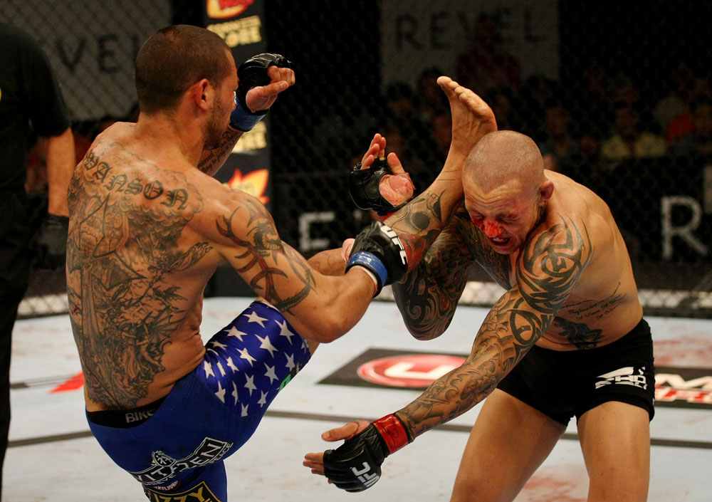 ATLANTIC CITY, NJ - JUNE 22: Cub Swanson (L) kicks Ross Pearson (R) in a featherweight bout during UFC on FX 4 at Revel Casino on June 22, 2012 in Atlantic City, New Jersey.  (Photo by Nick Laham/Zuffa LLC/Zuffa LLC)