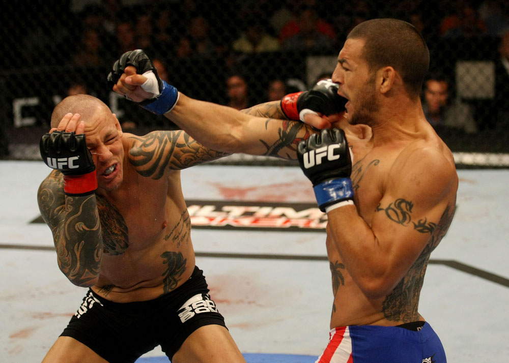 ATLANTIC CITY, NJ - JUNE 22: Cub Swanson (R) exchanges punches with Ross Pearson (L) in a featherweight bout during UFC on FX 4 at Revel Casino on June 22, 2012 in Atlantic City, New Jersey. (Photo by Nick Laham/Zuffa LLC/Zuffa LLC)