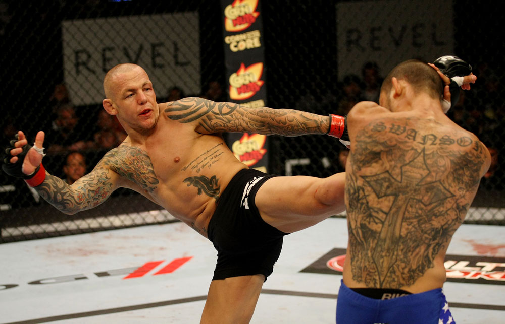 ATLANTIC CITY, NJ - JUNE 22:  Ross Pearson (L) kicks Cub Swanson (R) in a featherweight bout during UFC on FX 4 at Revel Casino on June 22, 2012 in Atlantic City, New Jersey.  (Photo by Nick Laham/Zuffa LLC/Zuffa LLC)