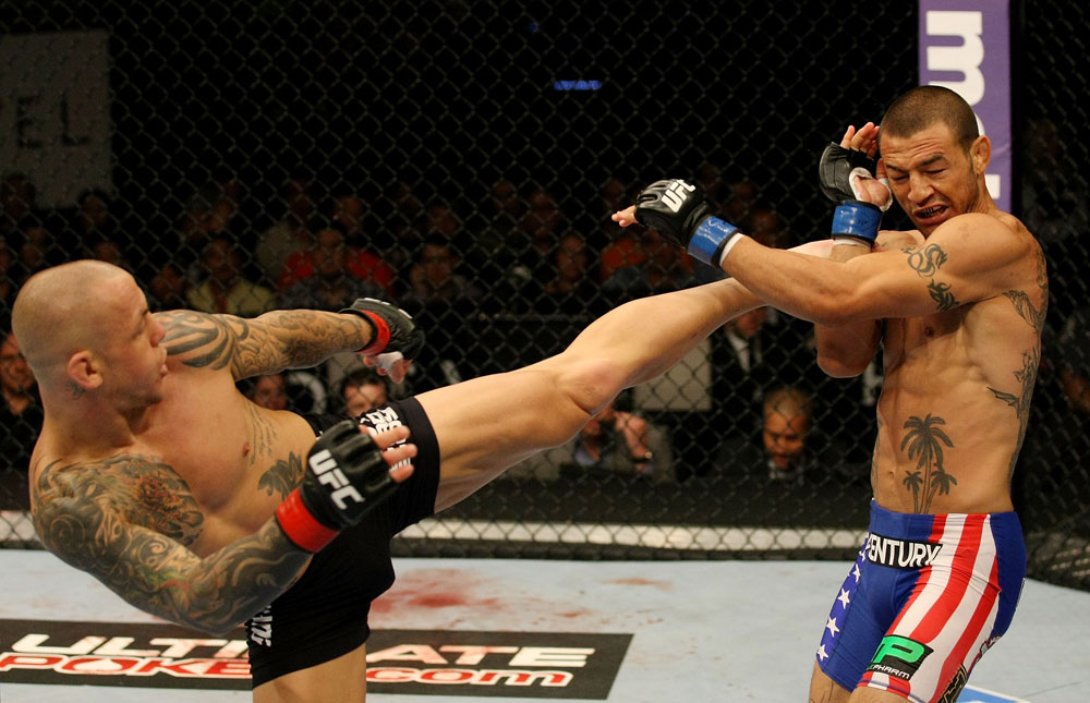 ATLANTIC CITY, NJ - JUNE 22: Ross Pearson (L) kicks Cub Swanson (R) in a featherweight bout during UFC on FX 4 at Revel Casino on June 22, 2012 in Atlantic City, New Jersey.  (Photo by Nick Laham/Zuffa LLC/Zuffa LLC)