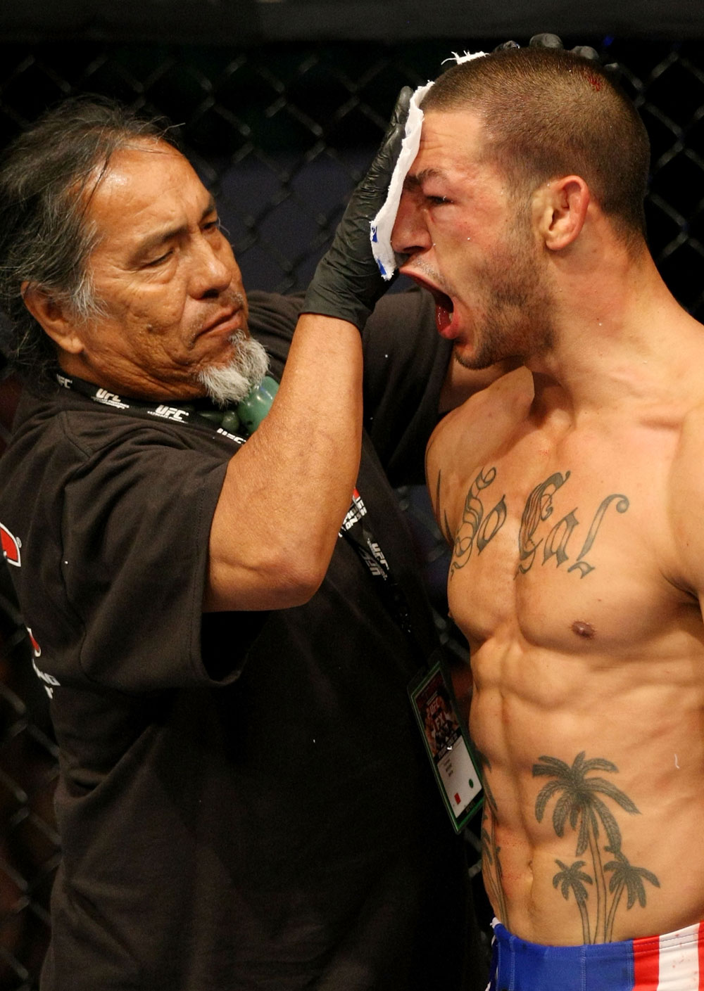 ATLANTIC CITY, NJ - JUNE 22: Cub Swanson (R) is tended to during his featherweight bout against Ross Pearson (not pictured) during UFC on FX 4 at Revel Casino on June 22, 2012 in Atlantic City, New Jersey.  (Photo by Nick Laham/Zuffa LLC/Zuffa LLC)