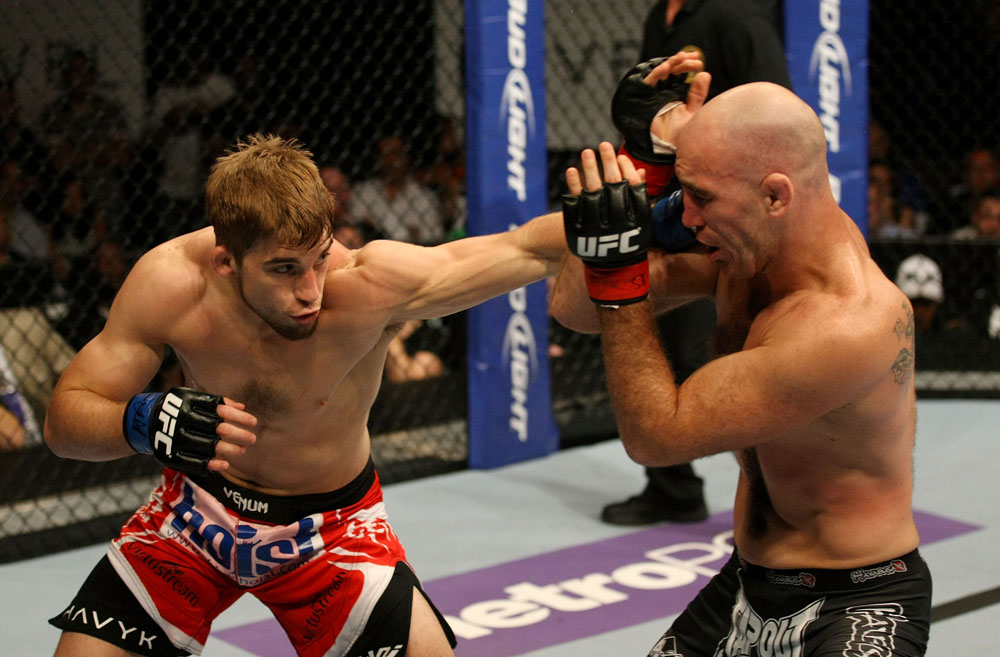 ATLANTIC CITY, NJ - JUNE 22: T.J. Waldburger (L) punches Brian Ebersole (R) in a welterweight bout during UFC on FX 4 at Revel Casino on June 22, 2012 in Atlantic City, New Jersey.  (Photo by Nick Laham/Zuffa LLC/Zuffa LLC)