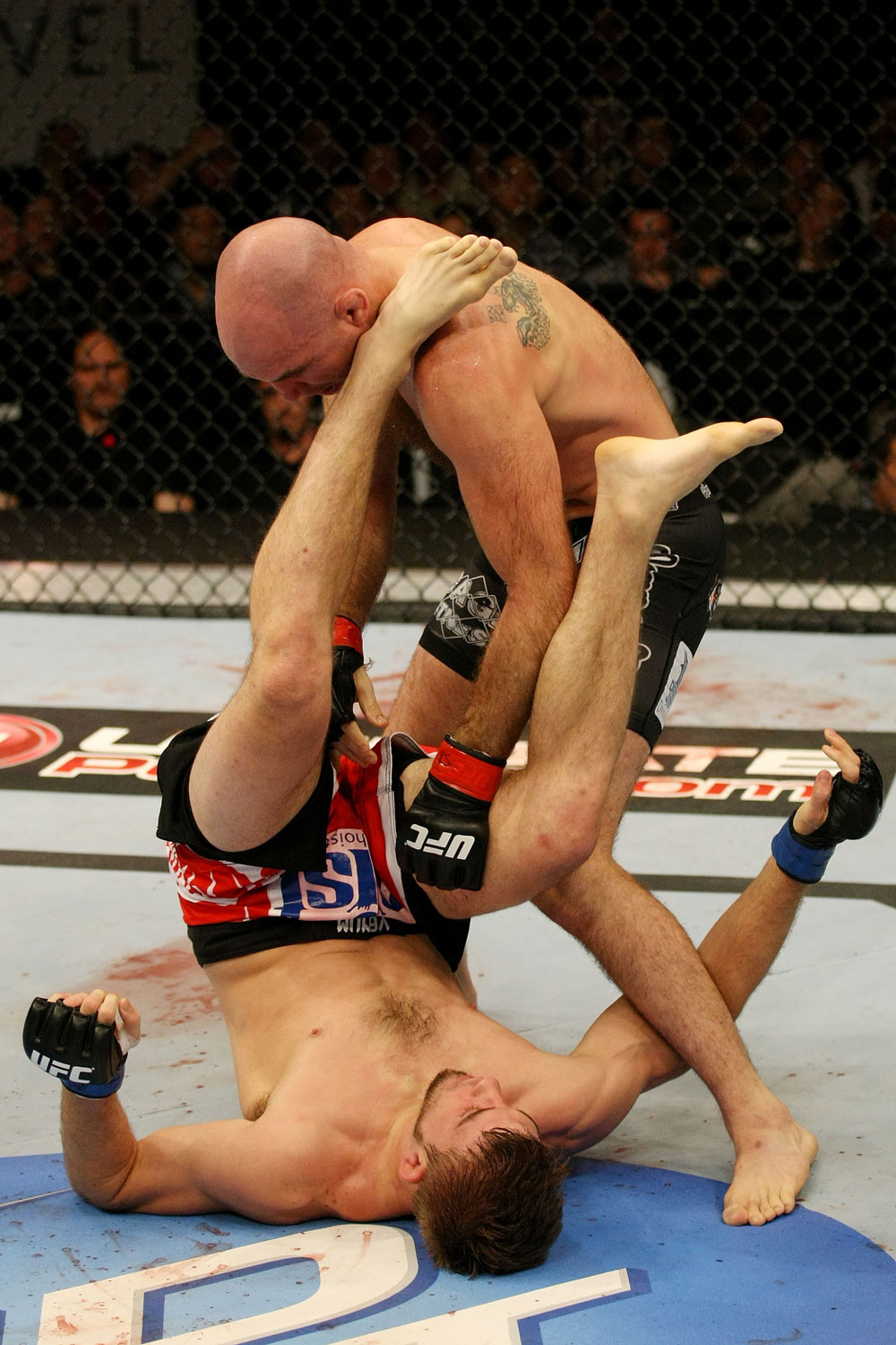 ATLANTIC CITY, NJ - JUNE 22:  Brian Ebersole (T) battles T.J. Waldburger (B) in a welterweight bout during UFC on FX 4 at Revel Casino on June 22, 2012 in Atlantic City, New Jersey.  (Photo by Nick Laham/Zuffa LLC/Zuffa LLC)