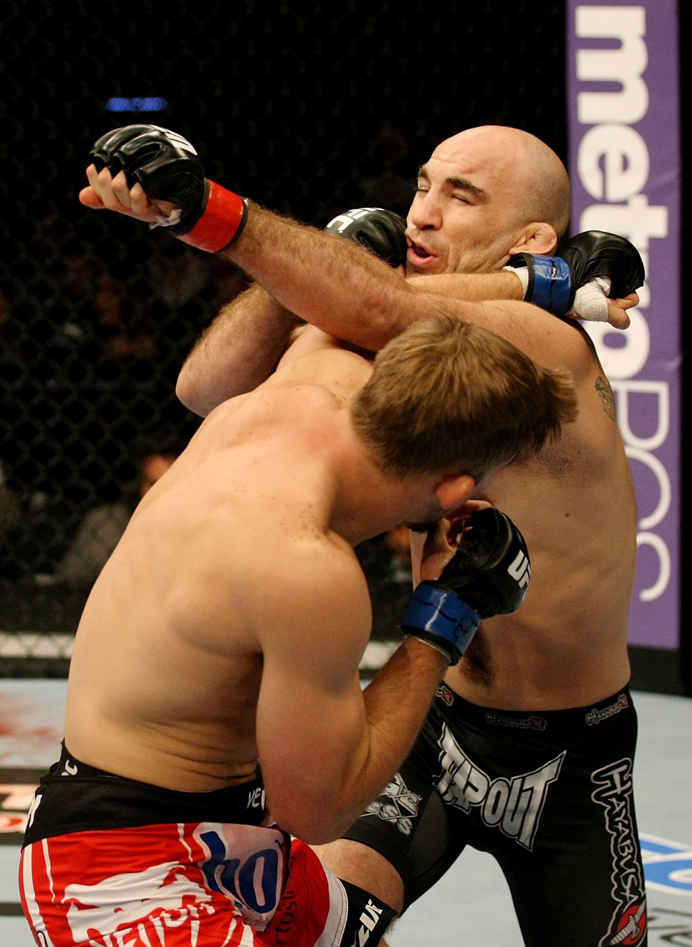 ATLANTIC CITY, NJ - JUNE 22:  Brian Ebersole (R) exchanges punches with T.J. Waldburger (L) in a welterweight bout during UFC on FX 4 at Revel Casino on June 22, 2012 in Atlantic City, New Jersey.  (Photo by Nick Laham/Zuffa LLC/Zuffa LLC)