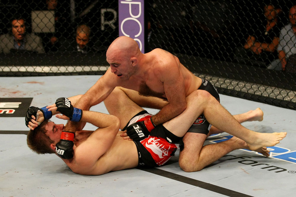 ATLANTIC CITY, NJ - JUNE 22: Brian Ebersole (R) punches T.J. Waldburger (L) in a welterweight bout during UFC on FX 4 at Revel Casino on June 22, 2012 in Atlantic City, New Jersey.  (Photo by Nick Laham/Zuffa LLC/Zuffa LLC)