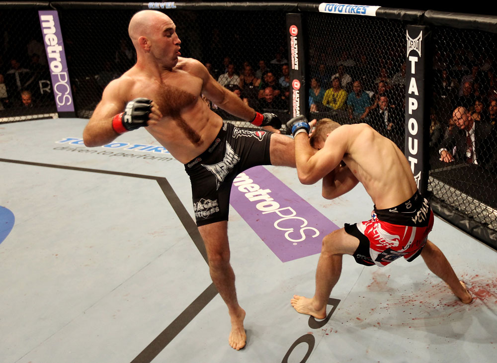 ATLANTIC CITY, NJ - JUNE 22: Brian Ebersole (L) kicks T.J. Waldburger (R) in a welterweight bout during UFC on FX 4 at Revel Casino on June 22, 2012 in Atlantic City, New Jersey.  (Photo by Nick Laham/Zuffa LLC/Zuffa LLC)