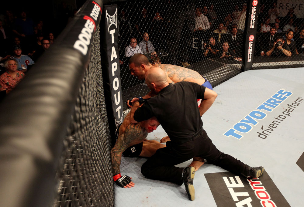 ATLANTIC CITY, NJ - JUNE 22:  Referee Yves Lavigne (C) ends the fight between Ross Pearson (L) and Cub Swanson (R) in a featherweight bout during UFC on FX 4 at Revel Casino on June 22, 2012 in Atlantic City, New Jersey.  (Photo by Nick Laham/Zuffa LLC/Zuffa LLC)