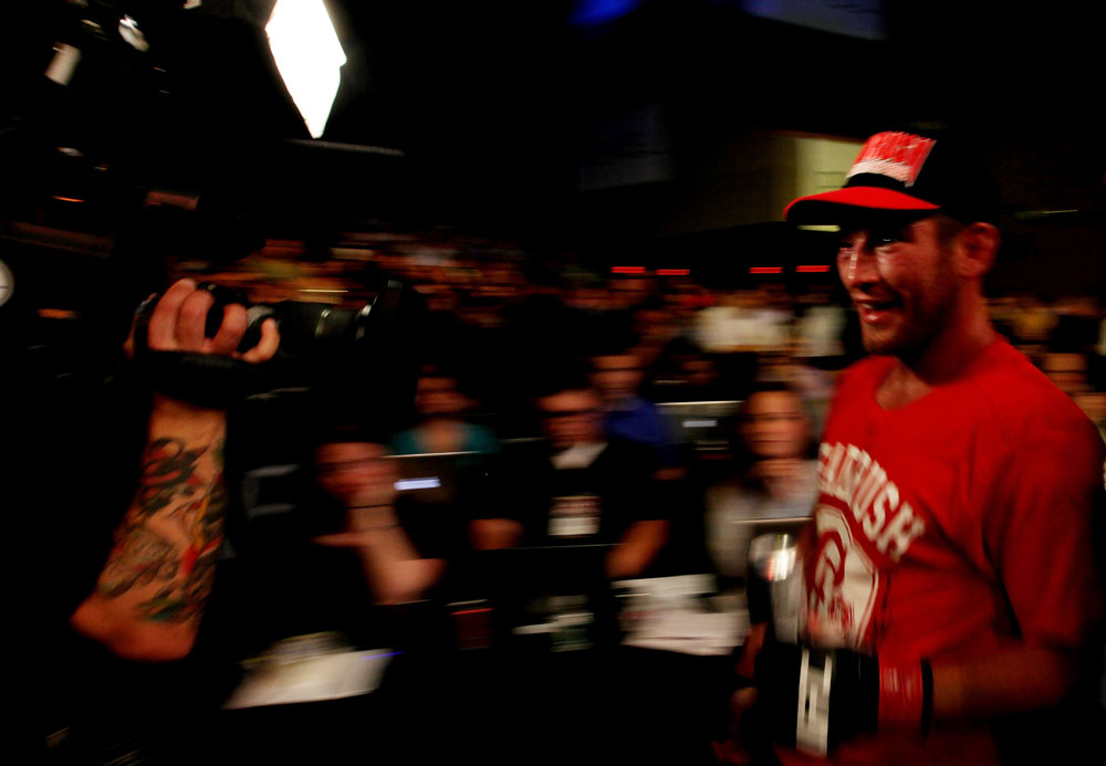 ATLANTIC CITY, NJ - JUNE 22:  Sam Stout is filmed as he leaves the octagon after his win by unanimous decision over Spencer Fisher (not pictured)  in their lightweight bout during UFC on FX 4 at Revel Casino on June 22, 2012 in Atlantic City, New Jersey.  (Photo by Nick Laham/Zuffa LLC/Zuffa LLC)