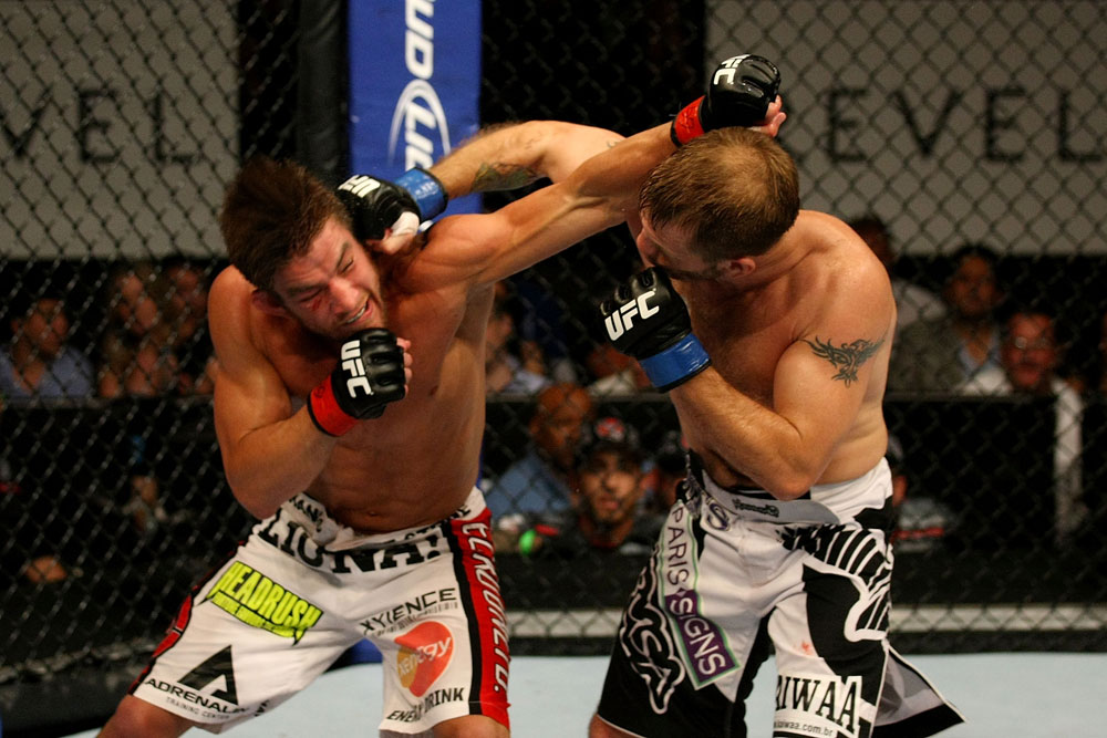 ATLANTIC CITY, NJ - JUNE 22: Sam Stout (L) exchanges punches with Spencer Fisher (R) in a lightweight bout during UFC on FX 4 at Revel Casino on June 22, 2012 in Atlantic City, New Jersey. (Photo by Nick Laham/Zuffa LLC/Zuffa LLC)