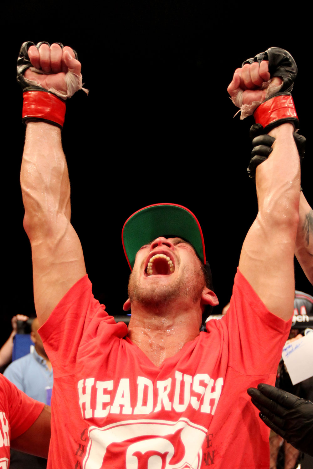 ATLANTIC CITY, NJ - JUNE 22: Sam Stout celebrates his win by unanimous decision over Spencer Fisher (not pictured)  in their lightweight bout during UFC on FX 4 at Revel Casino on June 22, 2012 in Atlantic City, New Jersey.  (Photo by Nick Laham/Zuffa LLC/Zuffa LLC)