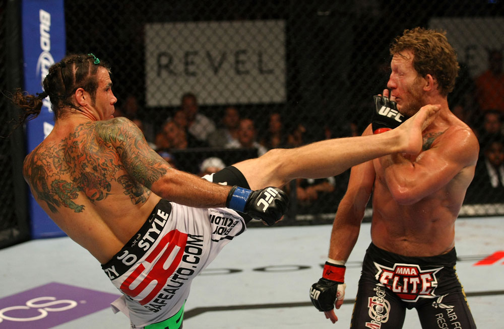 ATLANTIC CITY, NJ - JUNE 22:  Clay Guida (L) throws a kick against Gray Maynard (R) in the main event lightweight bout during UFC on FX 4 at Revel Casino on June 22, 2012 in Atlantic City, New Jersey.  (Photo by Nick Laham/Zuffa LLC/Zuffa LLC)