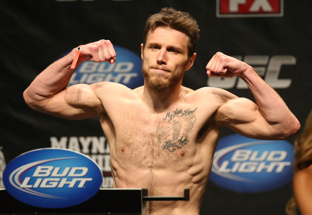 ATLANTIC CITY, NJ - JUNE 21: Dan Miller flexes after making weight during the UFC on FX official weigh in at Revel Casino on June 21, 2012 in Atlantic City, New Jersey.  (Photo by Nick Laham/Zuffa LLC/Zuffa LLC via Getty Images)