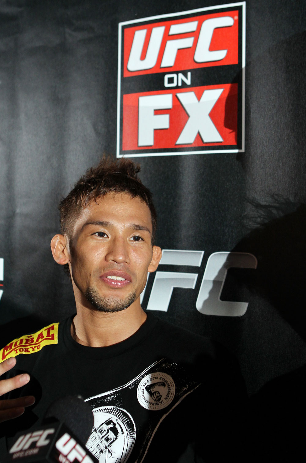 SYDNEY, AUSTRALIA - FEBRUARY 28: Yasuhiro Urushitani answers questions from the media during the UFC on FX open workouts at the Star Casino on February 28, 2012 in Sydney, Australia. (Photo by Josh Hedges/Zuffa LLC/Zuffa LLC via Getty Images) *** Local Caption *** Yasuhiro Urushitani