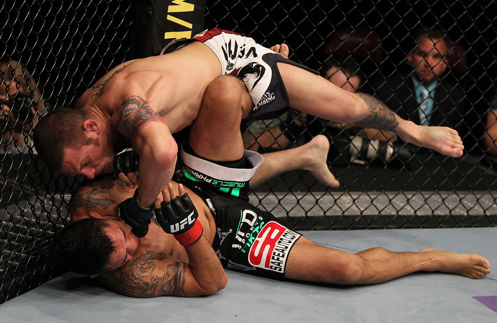 SUNRISE, FL - JUNE 08:   (R-L) Matt Grice punches Leonard Garcia in Featherweight bout during the UFC on FX 3 event at Bank Atlantic Center on June 8, 2012 in Sunrise, Florida.  (Photo by Josh Hedges/Zuffa LLC/Zuffa LLC via Getty Images)