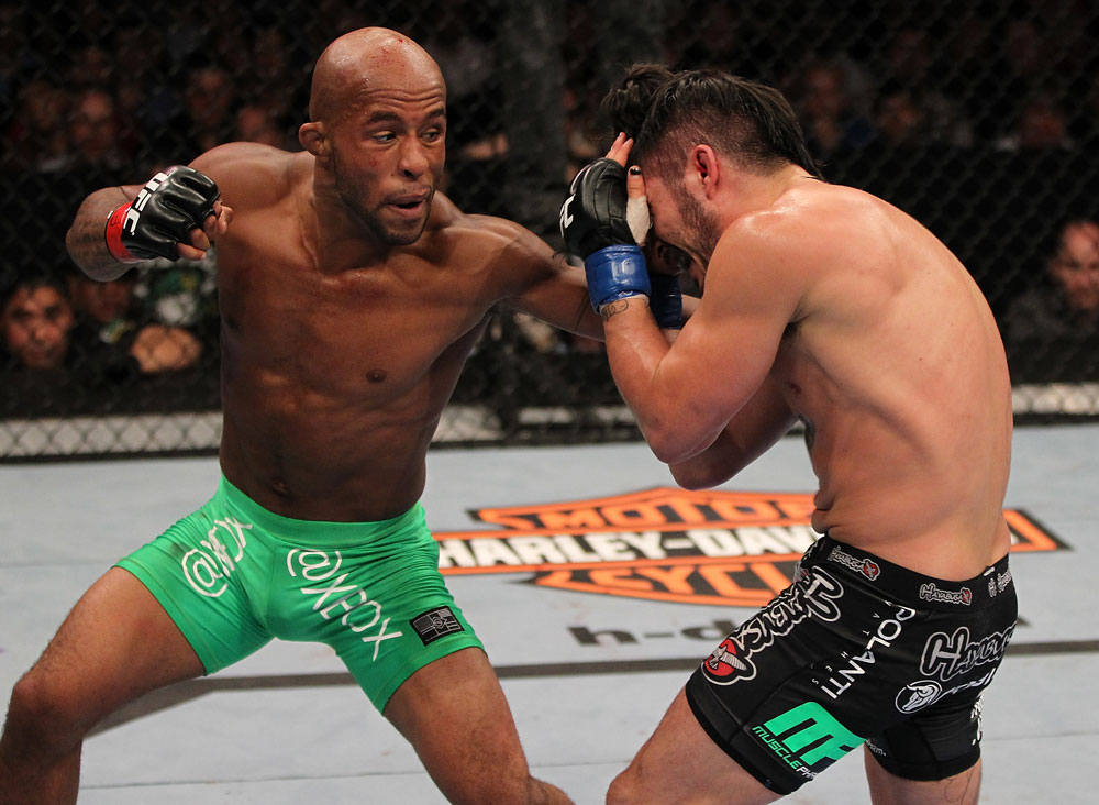SUNRISE, FL - JUNE 08:   (L-R) Demetrious Johnson punches Ian McCall in a Flyweight bout during the UFC on FX 3 event at Bank Atlantic Center on June 8, 2012 in Sunrise, Florida.  (Photo by Josh Hedges/Zuffa LLC/Zuffa LLC via Getty Images)