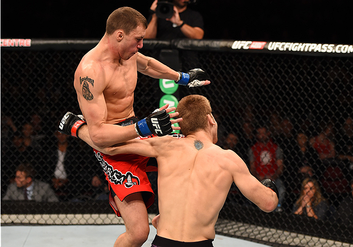 ADELAIDE, AUSTRALIA - MAY 10: (L-R) <a href='../fighter/James-Vick'>James Vick</a> knees <a href='../fighter/jake-matthews'>Jake Matthews</a> in their lightweight bout during the UFC Fight Night event at the Adelaide Entertainment Centre on May 10, 2015 in Adelaide, Australia. (Photo by Josh Hedges/Zuffa LLC/Zuffa LLC via Getty Images)