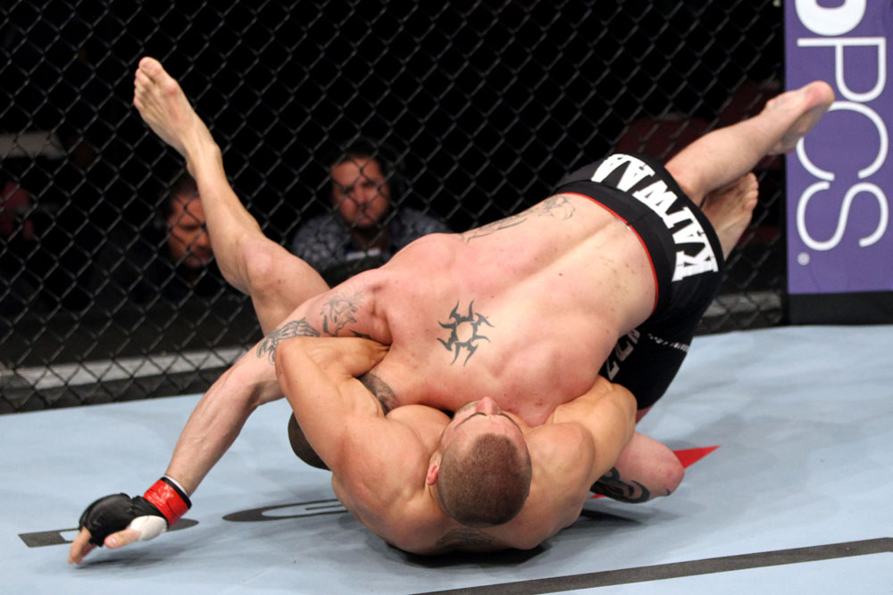 EAST RUTHERFORD, NJ - MAY 05: Mike Massenzio slams Karlos Vemola during thier Middleweight bout at Izod Center on May 5, 2012 in East Rutherford, New Jersey. (Photo by Josh Hedges/Zuffa LLC/Zuffa LLC via Getty Images)