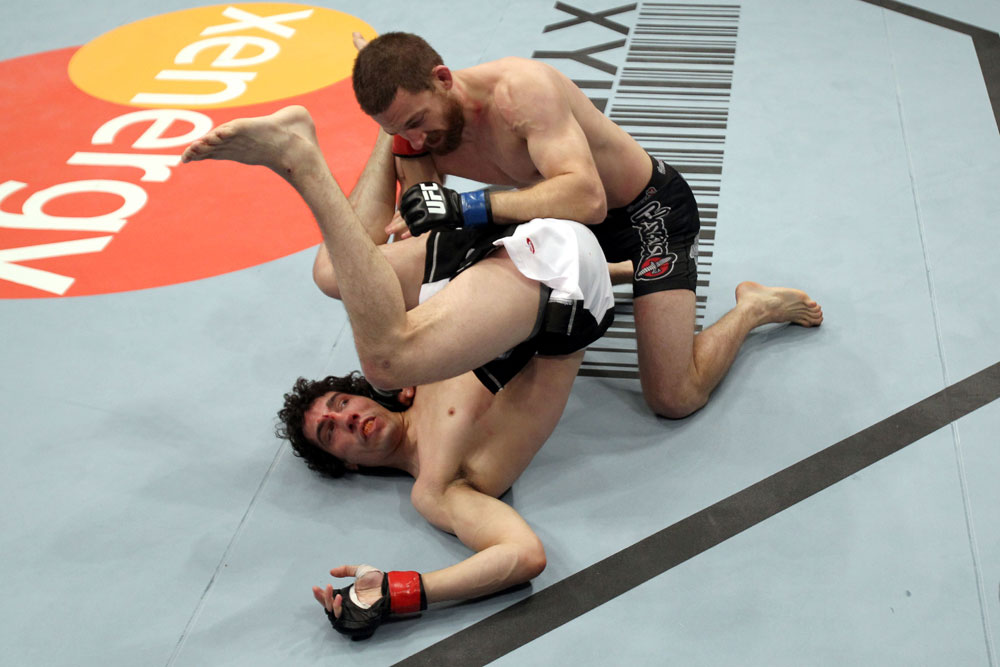 EAST RUTHERFORD, NJ - MAY 05: Nick Denis slams Roland Delorme to the ground during thier Bantamweight bout at Izod Center on May 5, 2012 in East Rutherford, New Jersey. (Photo by Josh Hedges/Zuffa LLC/Zuffa LLC via Getty Images)