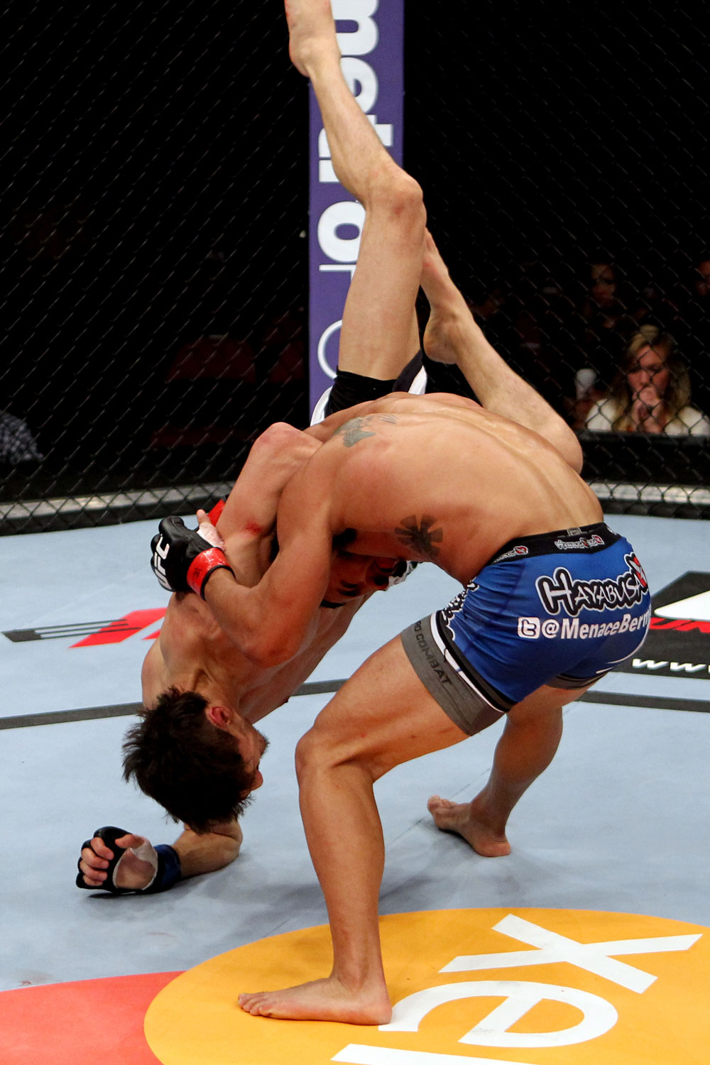 EAST RUTHERFORD, NJ - MAY 05: Dennis Bermudez slams Pablo Garza to the ground during thier Bantamweight bout at Izod Center on May 5, 2012 in East Rutherford, New Jersey. (Photo by Josh Hedges/Zuffa LLC/Zuffa LLC via Getty Images)