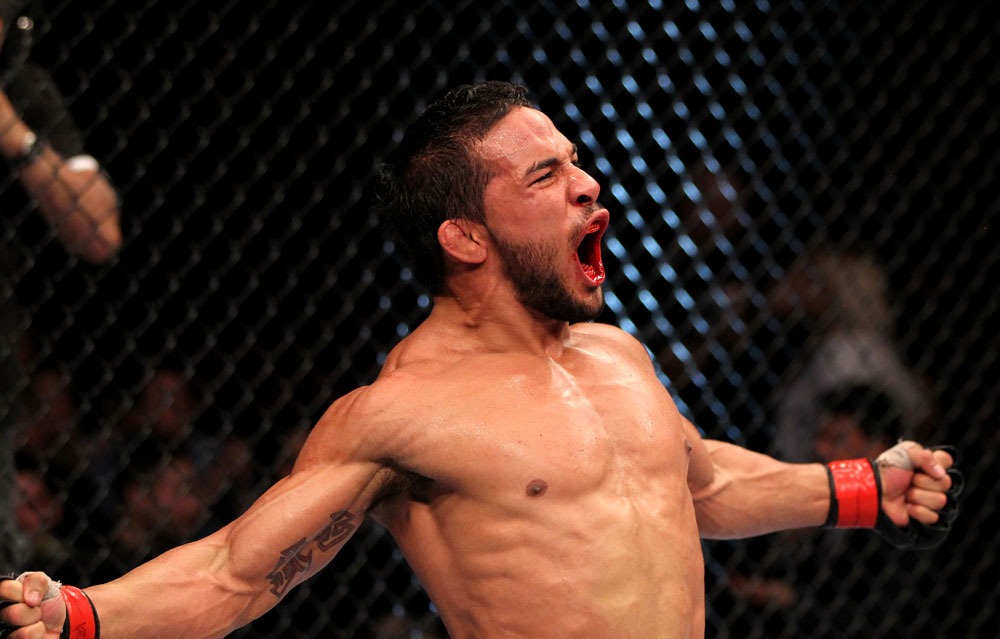 EAST RUTHERFORD, NJ - MAY 05: Dennis Bermudez celebrates after defeating Pablo Garza in thier Bantamweight bout at Izod Center on May 5, 2012 in East Rutherford, New Jersey. (Photo by Josh Hedges/Zuffa LLC/Zuffa LLC via Getty Images)