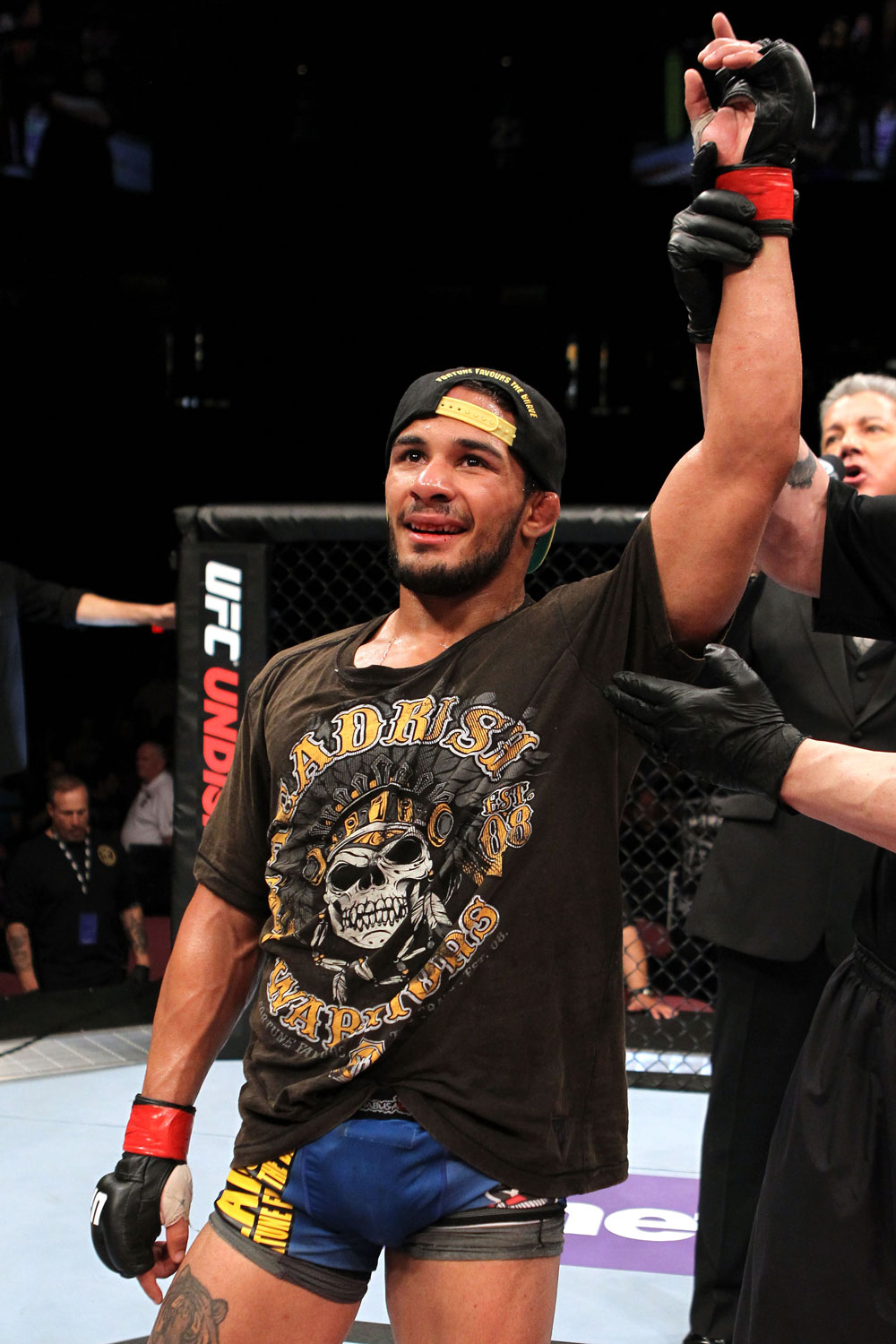 EAST RUTHERFORD, NJ - MAY 05: Dennis Bermudez celebrates after defeating Pablo Garza in thier Bantamweight bout at Izod Center on May 5, 2012 in East Rutherford, New Jersey. (Photo by Josh Hedges/Zuffa LLC/Zuffa LLC via Getty Images)