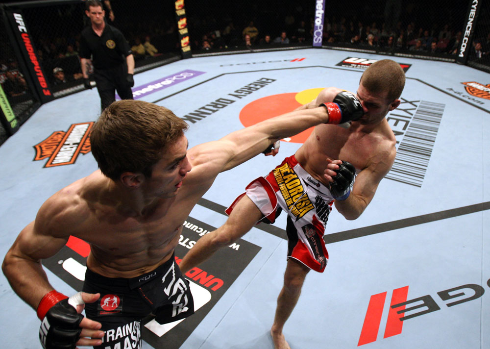 EAST RUTHERFORD, NJ - MAY 05: John Hathaway (L) punches Pascal Krauss (R) in the face during thier Welterweight bout at Izod Center on May 5, 2012 in East Rutherford, New Jersey. (Photo by Josh Hedges/Zuffa LLC/Zuffa LLC via Getty Images)