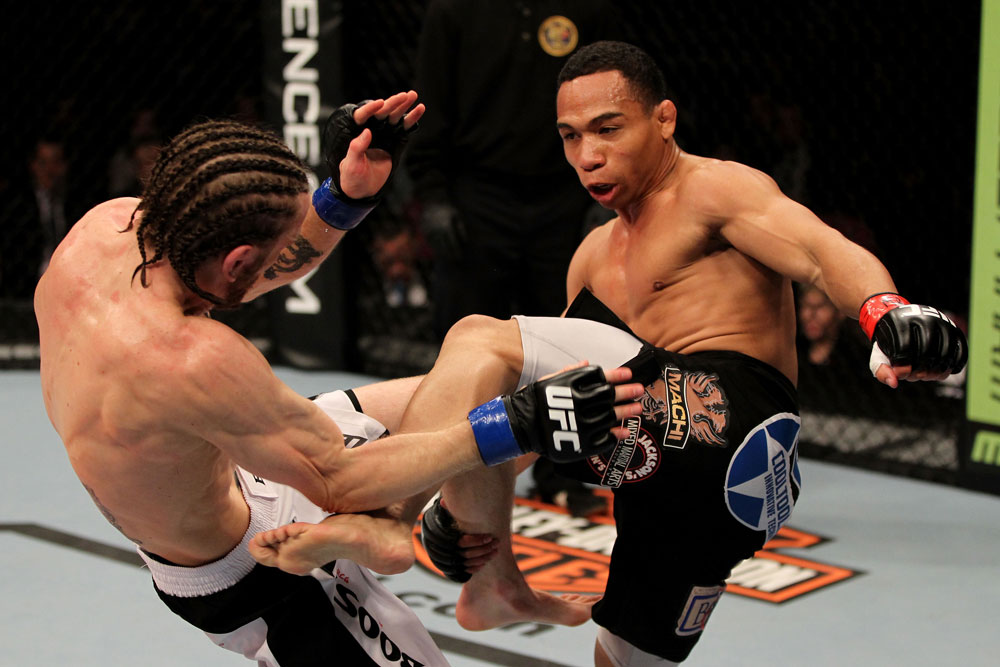 EAST RUTHERFORD, NJ - MAY 05: John Dodson (R) and Timothy Elliott (L) fight during thier Flyweight bout at Izod Center on May 5, 2012 in East Rutherford, New Jersey. (Photo by Josh Hedges/Zuffa LLC/Zuffa LLC via Getty Images)