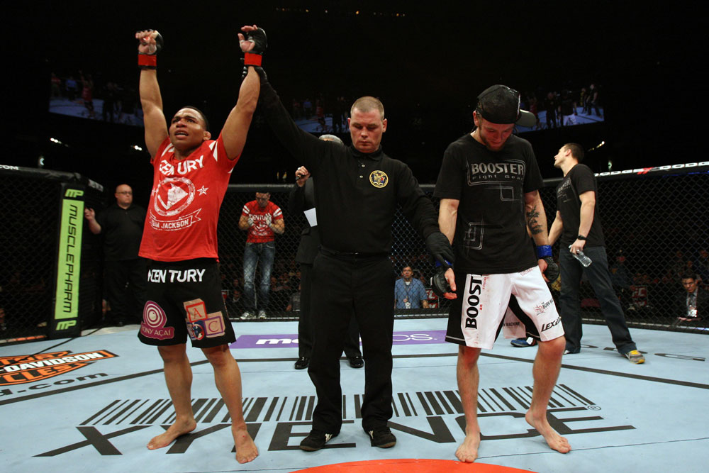 EAST RUTHERFORD, NJ - MAY 05: John Dodson (L) celebrates after defeating Timothy Elliott (R) during thier Flyweight bout at Izod Center on May 5, 2012 in East Rutherford, New Jersey. (Photo by Josh Hedges/Zuffa LLC/Zuffa LLC via Getty Images)