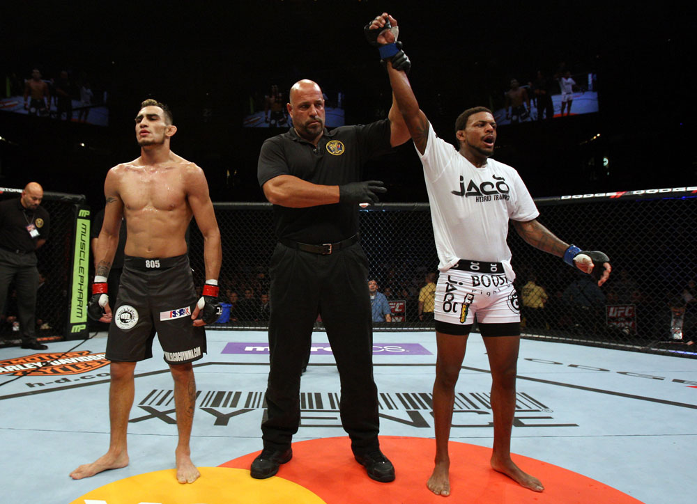 EAST RUTHERFORD, NJ - MAY 05: Michael Johnson(R) celebrates after defeating Tony Ferguson (L) in thier Flyweight bout at Izod Center on May 5, 2012 in East Rutherford, New Jersey. (Photo by Josh Hedges/Zuffa LLC/Zuffa LLC via Getty Images)